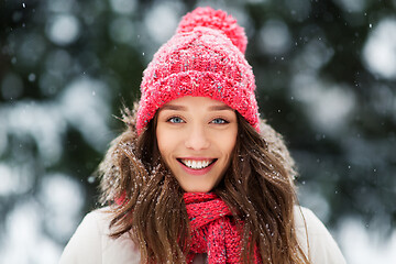 Image showing smiling teenage girl outdoors in winter