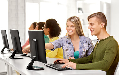 Image showing happy high school students in computer class