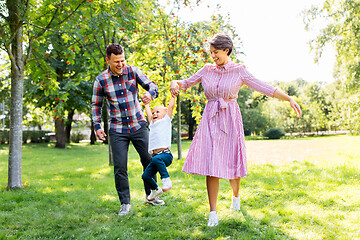 Image showing happy family having fun at summer park