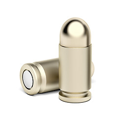 Image showing Two pistol bullets on white