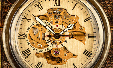 Image showing Antique clock dial close-up. Vintage pocket watch.