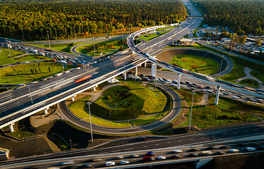 Image showing Aerial view of a freeway intersection traffic trails in Moscow.