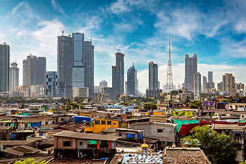 Image showing Views of slums on the shores of mumbai, India against the backdr