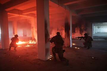 Image showing military troops in action urban environment