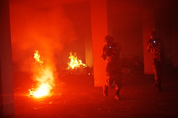 Image showing military troops in action urban environment