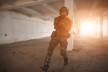 Image showing military troops in action urban environment