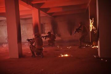 Image showing military troops in action urban environment