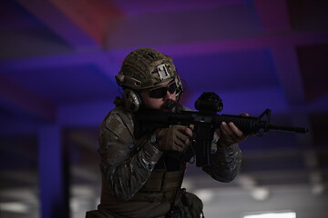 Image showing modern warfare soldier in urban environment battlefield