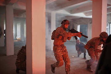 Image showing military troops in action urban environment