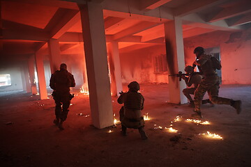 Image showing military troops in action urban environment