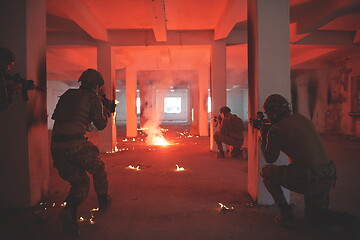 Image showing military troops in action urban environment