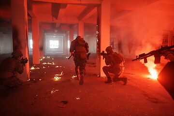 Image showing military troops in action urban environment