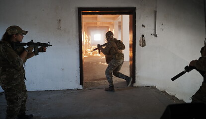 Image showing military troops in action urban environment