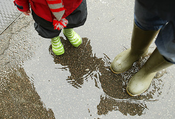 Image showing Puddles and Wellies