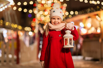 Image showing happy little girl at christmas with lantern market