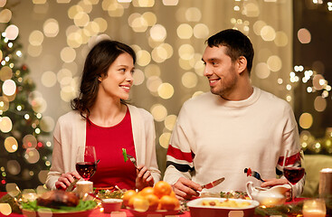 Image showing happy couple eating at christmas dinner