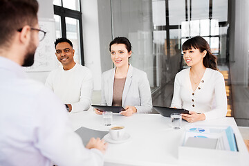 Image showing recruiters having job interview with employee