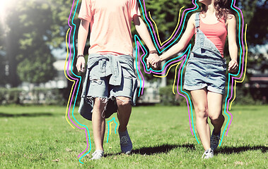 Image showing happy teenage couple walking at summer park