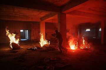 Image showing military troops in action urban environment