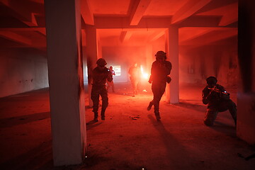 Image showing military troops in action urban environment