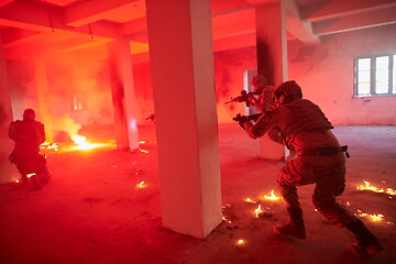 Image showing military troops in action urban environment