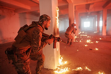 Image showing military troops in action urban environment