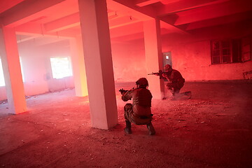 Image showing military troops in action urban environment