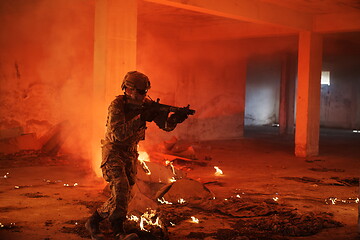 Image showing military troops in action urban environment