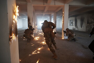 Image showing military troops in action urban environment