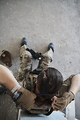 Image showing military female soldier having a break