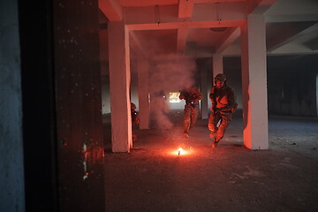 Image showing military troops in action urban environment