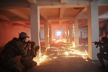 Image showing military troops in action urban environment