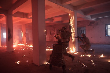 Image showing military troops in action urban environment