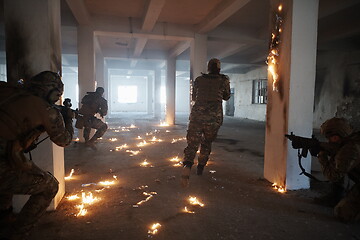 Image showing military troops in action urban environment