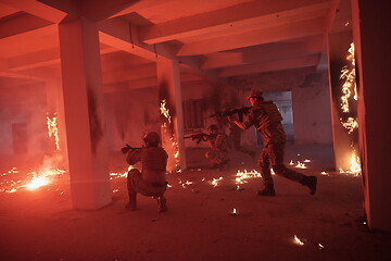 Image showing military troops in action urban environment