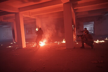 Image showing military troops in action urban environment