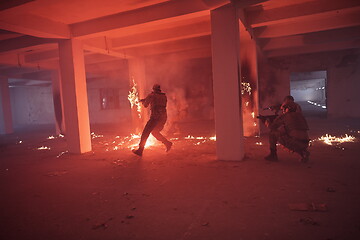 Image showing military troops in action urban environment