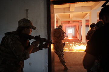 Image showing military troops in action urban environment