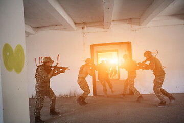 Image showing military troops in action urban environment