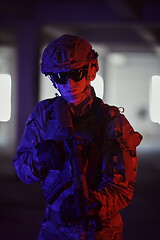 Image showing soldier squad team portrait in urban environment colored lightis