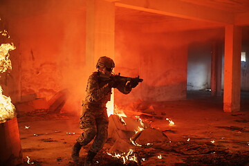 Image showing military troops in action urban environment