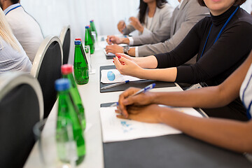 Image showing hands of businesswoman at business conference