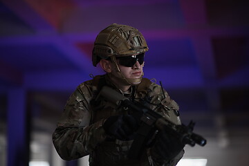 Image showing modern warfare soldier in urban environment battlefield