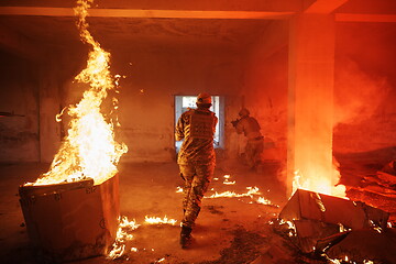 Image showing military troops in action urban environment