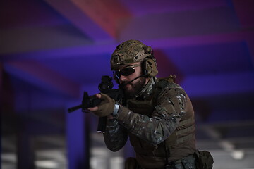 Image showing modern warfare soldier in urban environment battlefield