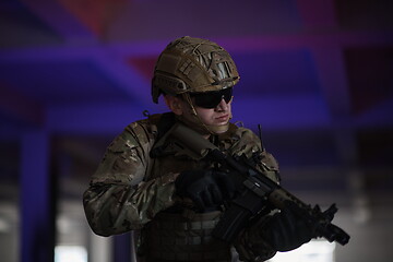 Image showing modern warfare soldier in urban environment battlefield