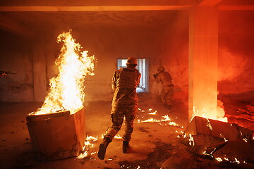 Image showing military troops in action urban environment