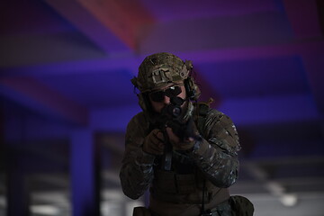 Image showing modern warfare soldier in urban environment battlefield