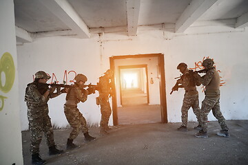 Image showing military troops in action urban environment