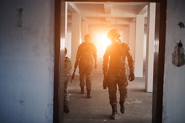 Image showing military troops in action urban environment